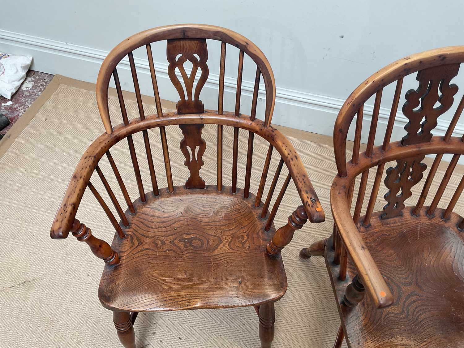 A near pair of 19th century elm and yew wood Windsor elbow chairs, with crinoline stretchers. - Image 2 of 3