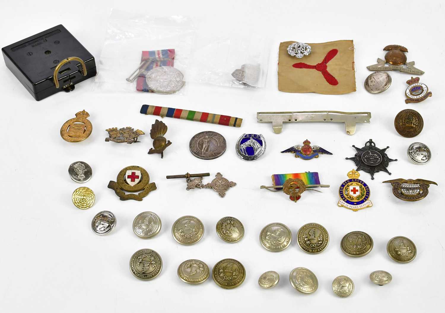 A collection of militaria, including a hallmarked silver Egypt Medal, Manchester Regiment, awarded