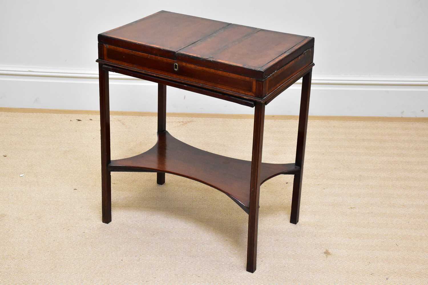 A Georgian inlaid mahogany gentleman's washstand/night table, the hinged covers enclosing mirror and