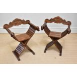 A pair of reproduction X-framed throne chairs (2).