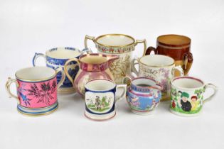 A collection of 19th century and later ceramics to include Staffordshire loving cups,