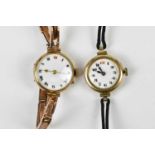 A 9ct yellow gold cased lady's wristwatch, the white enamel dial set with Roman numerals, together