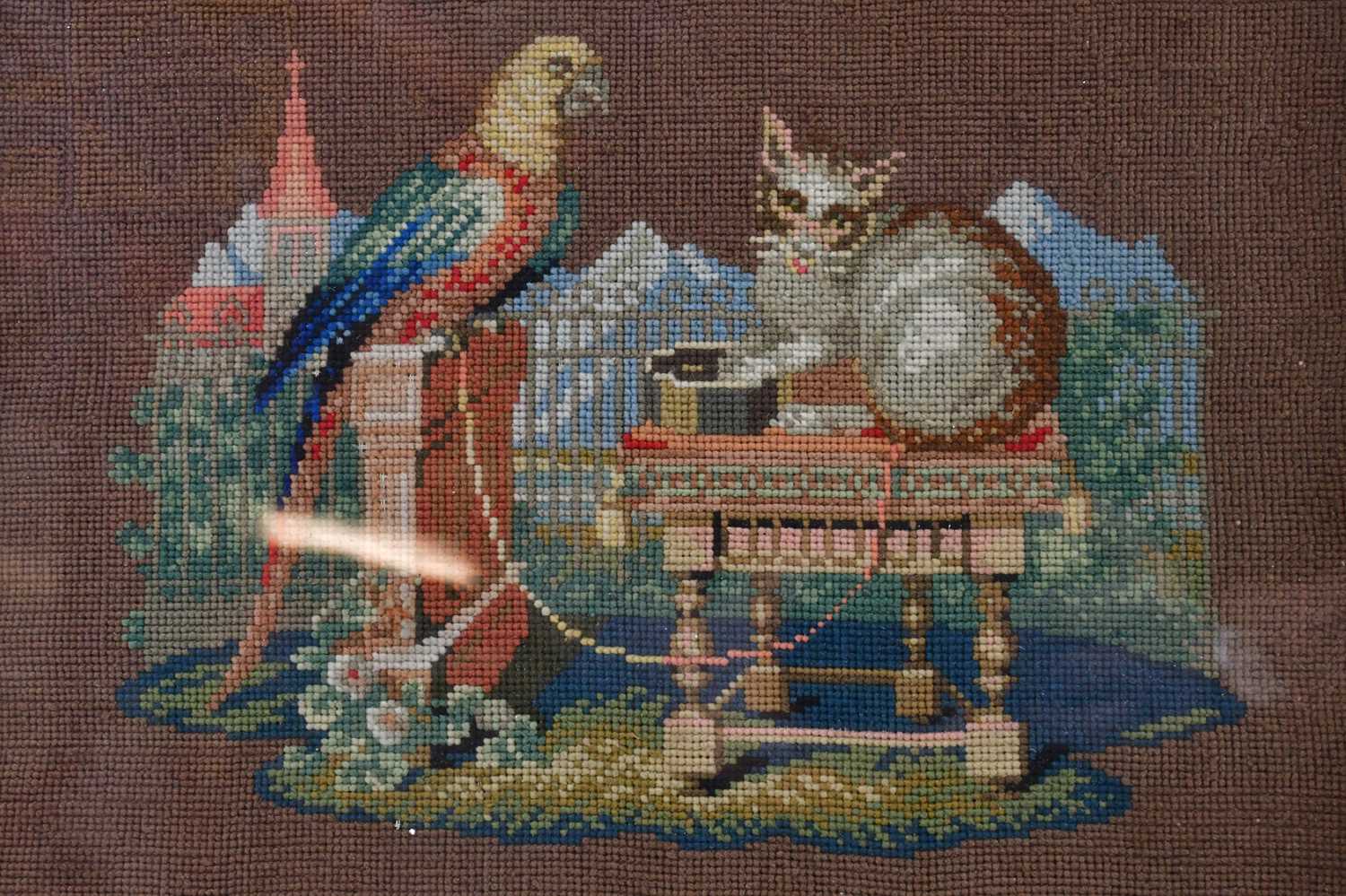 An oak needlework firescreen, height 53cm, together with a needlework of a cat and parrot in - Image 2 of 3