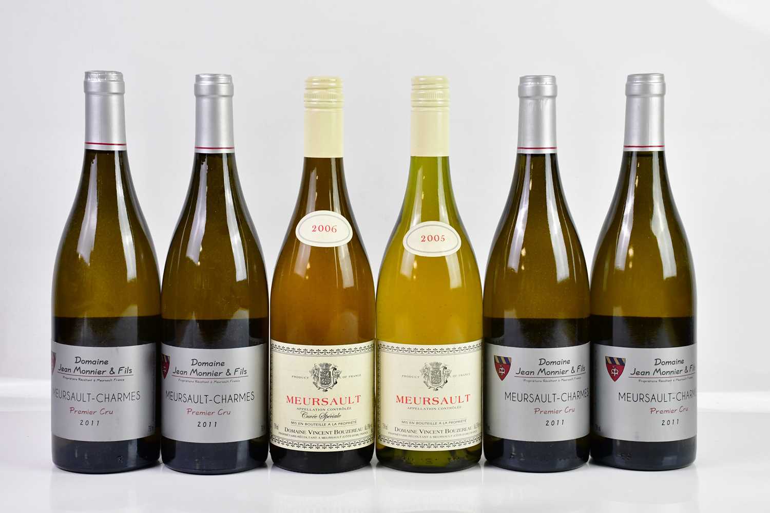 WHITE WINE; four bottles of Domaine Jean Monnier & Fils Meursault-Charmes 2011 and two bottles of