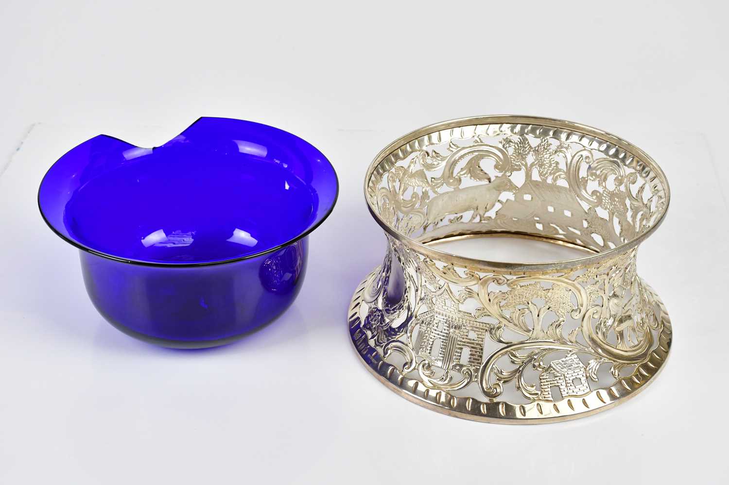 WEST & SON; a George V hallmarked silver dish/potato ring, with cast decoration depicting the Pied - Image 4 of 7