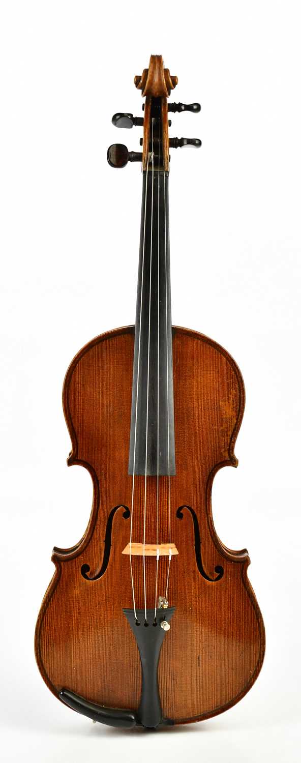 A full size German violin with two-piece back of good colour, length 36cm, unlabelled, cased.