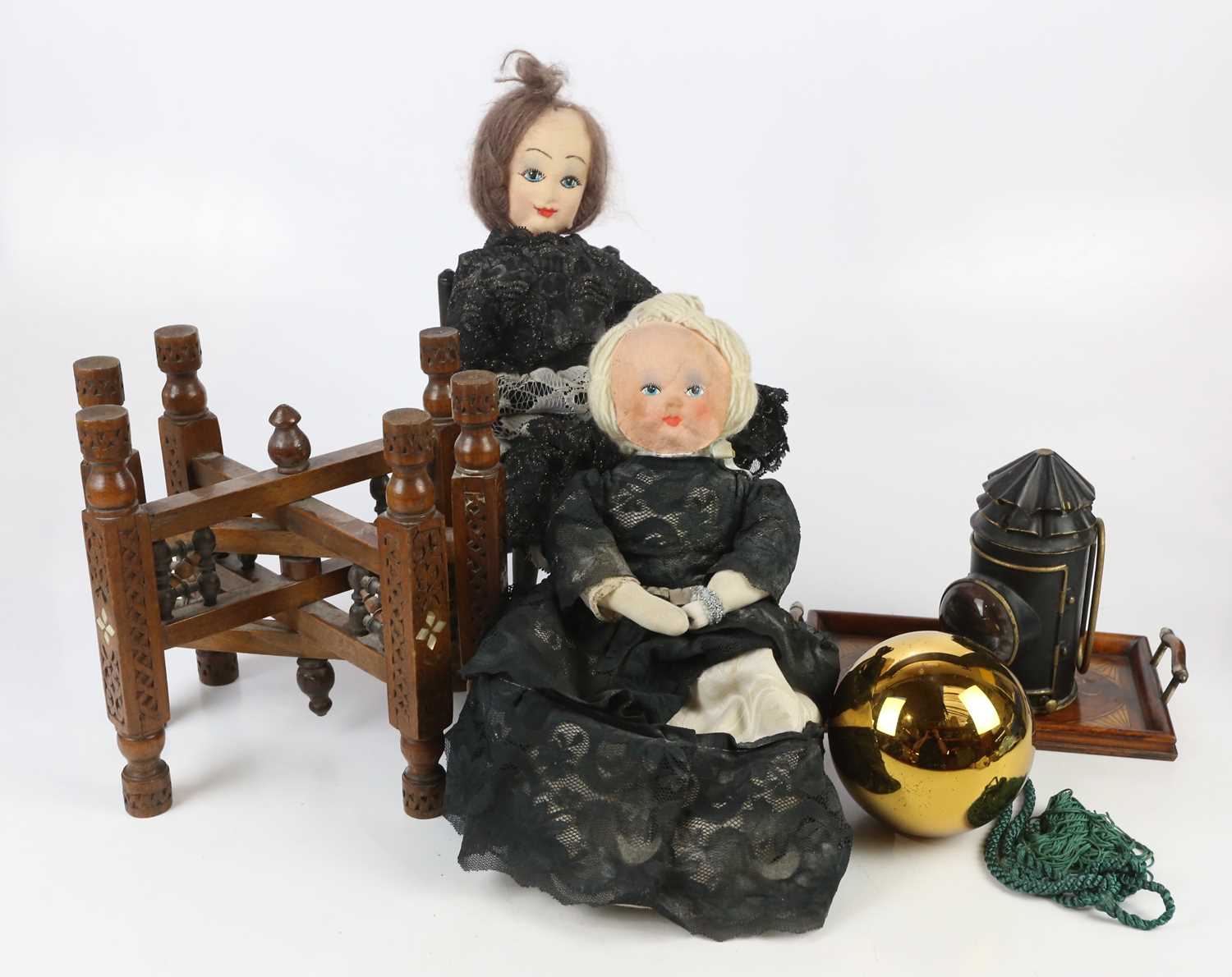 An assortment of collectors' items including a black painted cast metal lantern, a miniature painted