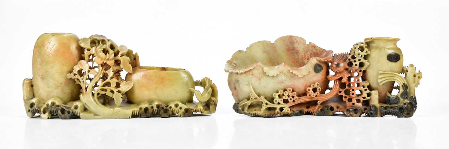 Two Chinese carved soapstone sculptures, with oval shaped vases and floral decoration, length