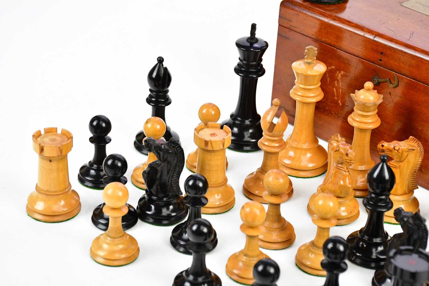 A Staunton pattern chess set in mahogany case, height of king 9.5cm, weighted. Condition Report: The - Image 3 of 5