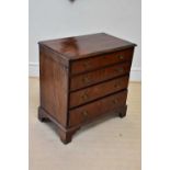 A George III mahogany chest of four long drawers, height 85cm, width 83cm, depth 48cm.