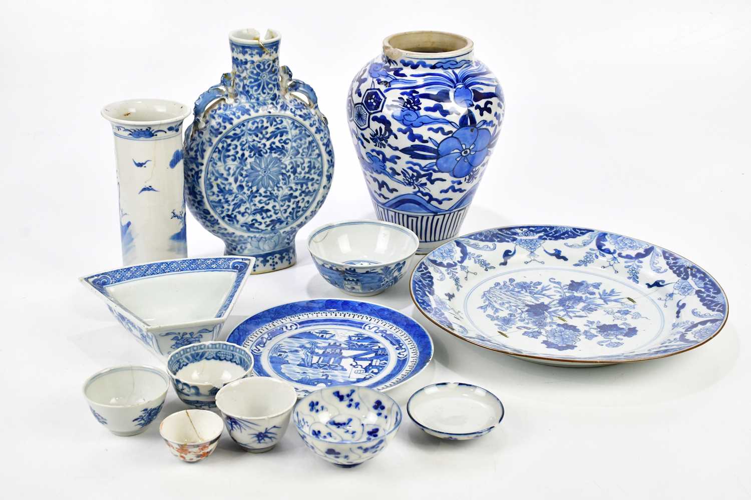 A collection of 18th century and later blue and white ceramics to include plates, tea cups, vases,