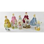 ROYAL WORCESTER; a collection of eleven figures including 'Grandmother's Dress' in five variant