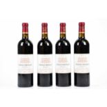 RED WINE; four bottles Château Preuillac Medoc, mis en Bouteille au Château, 2001, in wooden