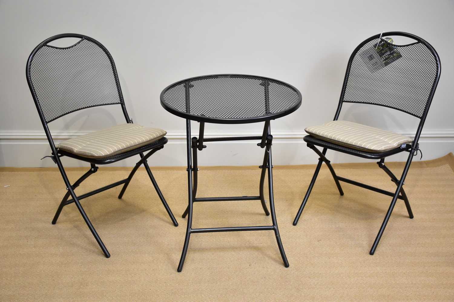 KETTLER; a modern folding garden table and two matching chairs (3).
