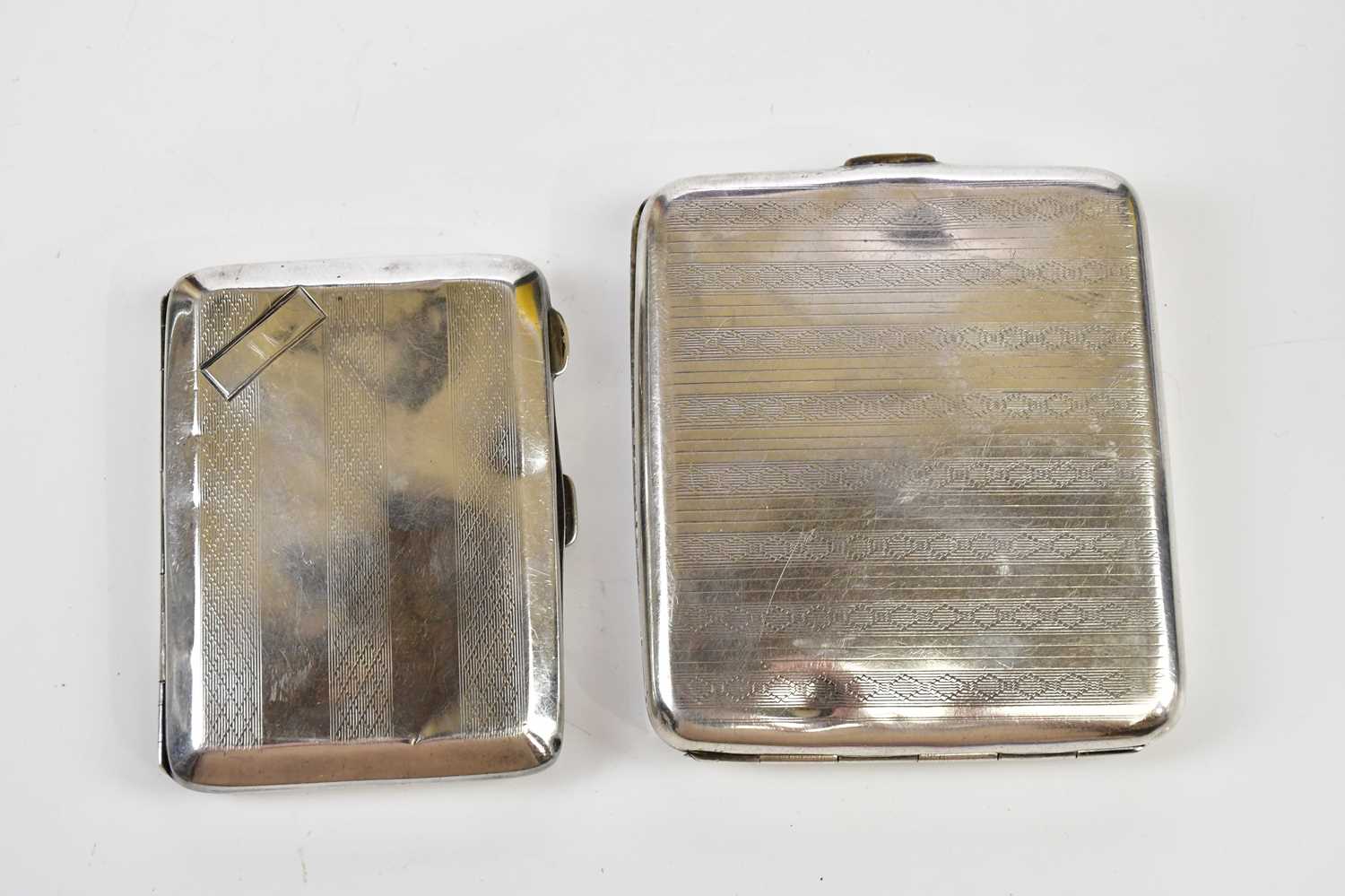 WILLIAM HAIR HASELER; a George V hallmarked silver cigarette case with engine turned decoration,