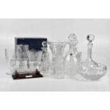 A collection of assorted glassware, including a Webb decanter, a Waterford decanter, a Royal Doulton