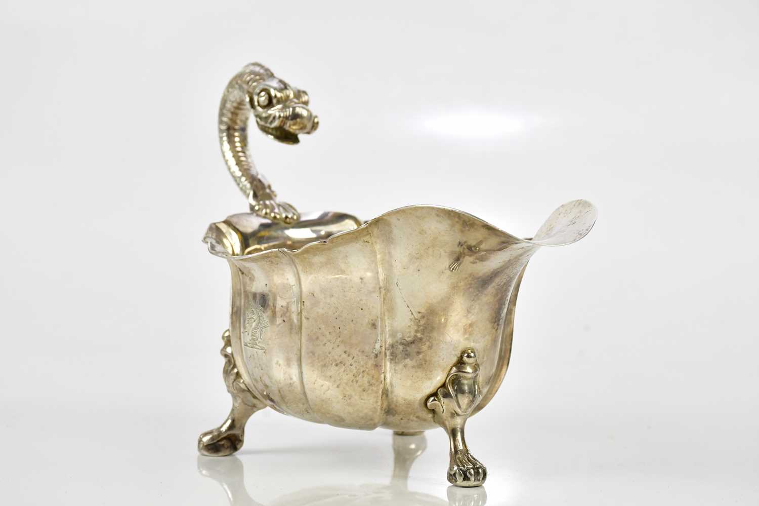 A good George III hallmarked silver sauceboat, with serpent handle and panelled body, on ball and - Image 2 of 7