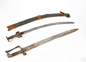 An Indian talwar with cast metal handle, length 82cm, and a similar Eastern sword (2)