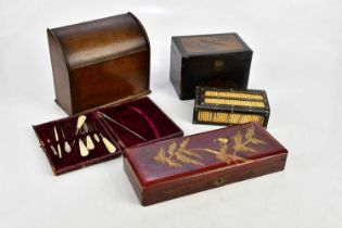 An early 20th century dome topped stationery cabinet, a porcupine quill box, a Japanese tea caddy