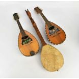 LUIGI POPPI, PALERMO; a bowl back mandolin, a flat back mandolin and an ethnic instrument (3).
