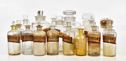 A collection of Victorian and later pharmaceutical bottles, predominantly examples with paper