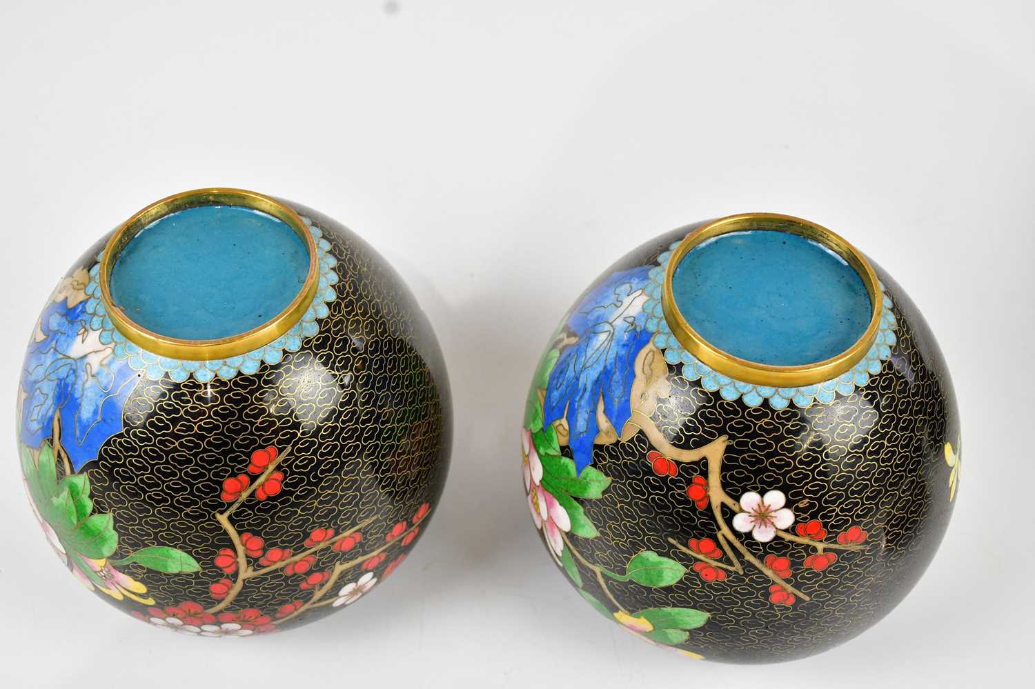 A pair of 20th century Chinese cloisonné ginger jars and covers, with prunus decoration, on wooden - Image 5 of 8