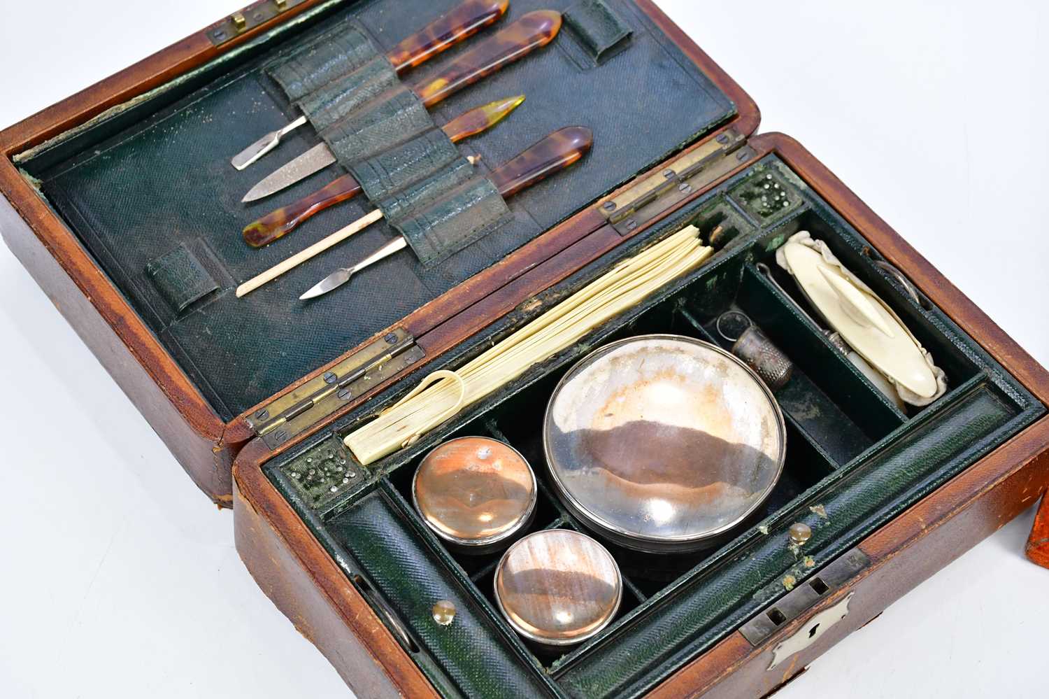 A Victorian leather travelling vanity set, the hinged cover enclosing fitted compartments and - Image 2 of 4