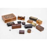 A collection of early 19th century and later snuff boxes including a Georgian papier-mâché