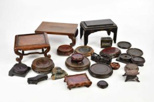 A collection of wooden Oriental stands.