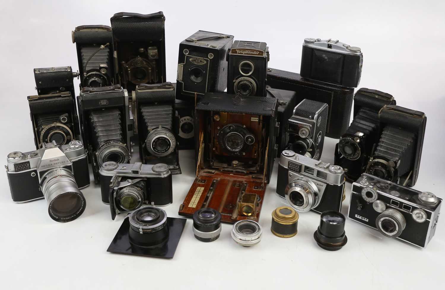 A collection of film cameras, to include large format, folding and 35mm, to include a Zeiss Ikon
