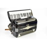 OFRED; a cased piano accordion, 120 bass.