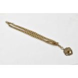 A 9ct yellow gold Albert chain with T-bar and fob, length 40cm, approx weight 73.2g.