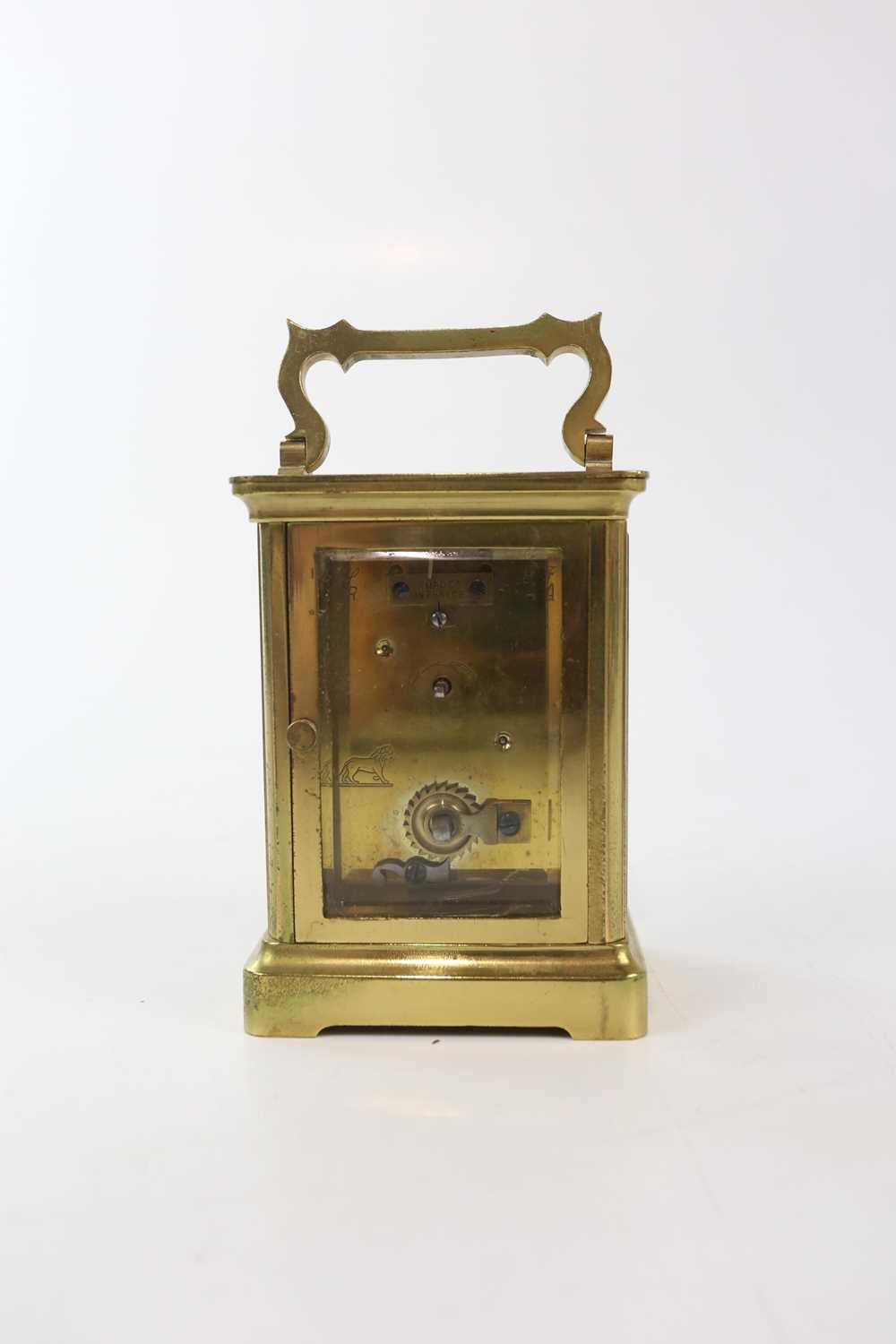 BRAMWELL & SONS; a French brass carriage timepiece, height with handle down 11.5cm, with leather - Image 3 of 5