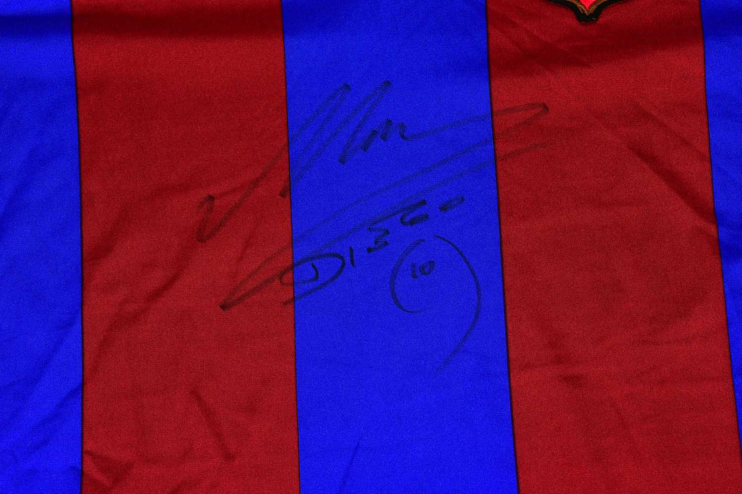 DIEGO MARADONA; a signed Barcelona retro style football shirt, signed to the front, size XL. - Image 2 of 3