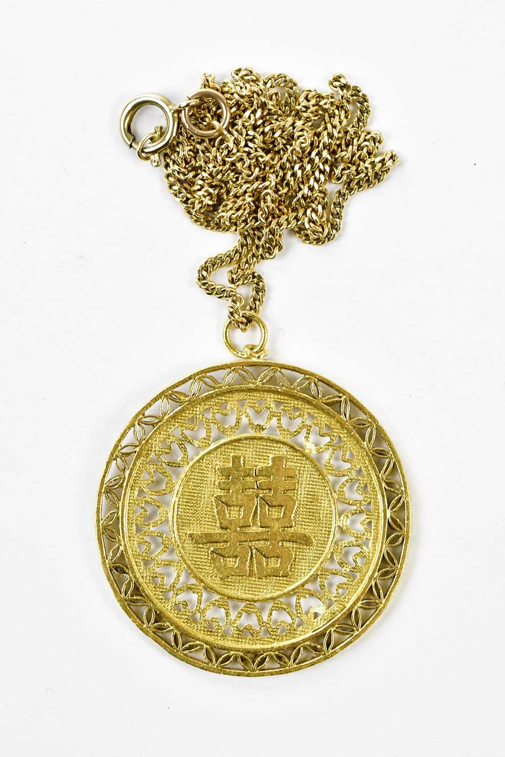 A Chinese yellow metal pendant on 9ct chain, combined approx 30.6g.