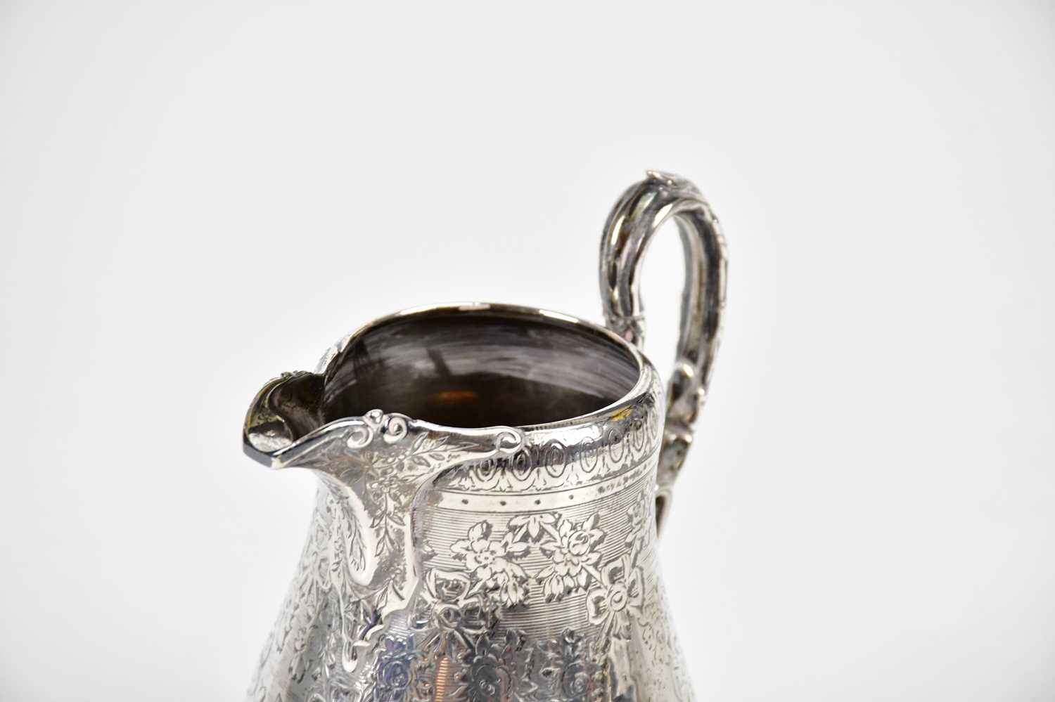 EDWARD, EDWARD JR, JOHN & WILLIAM BARNARD; a Victorian hallmarked silver cream jug with chased - Image 3 of 4