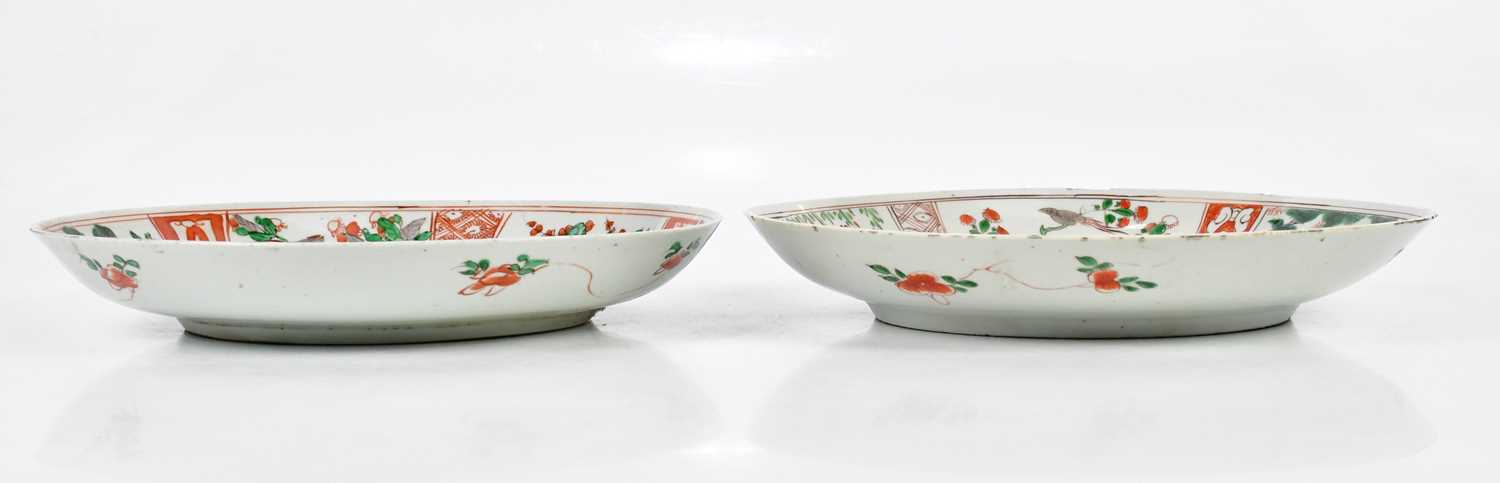 Two 19th century Chinese Famille Verte Wucai plates, each decorated with floral sprays within - Image 3 of 9