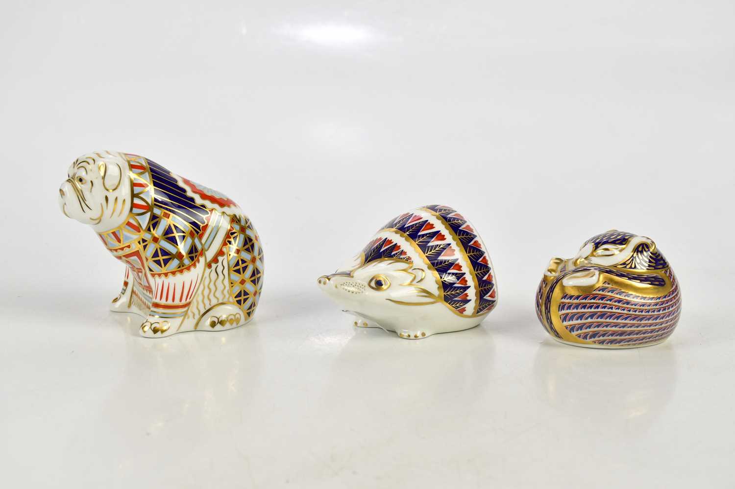 ROYAL CROWN DERBY; three animal form paperweights including bulldog and hedgehog (3). Condition