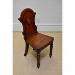A Victorian mahogany hall chair on turned tapering legs, with later added hinged seat, height 89cm.