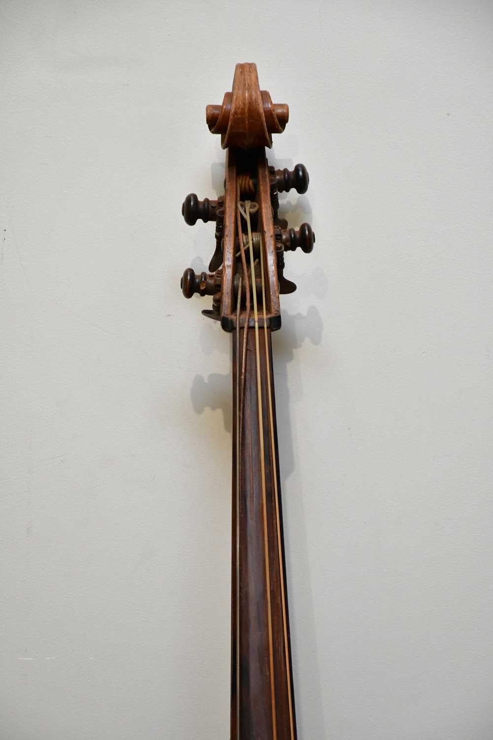 A double bass, possibly German, with two-piece back, 111cm to top of button, in need of restoration. - Image 2 of 25