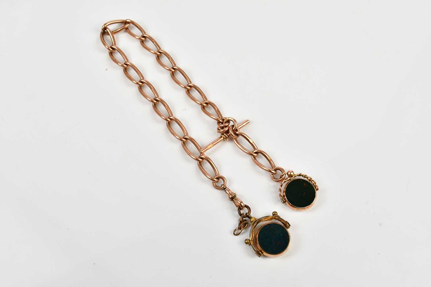 A 9ct yellow gold fob chain with two blood stone fobs, approximate weight 74.8g.