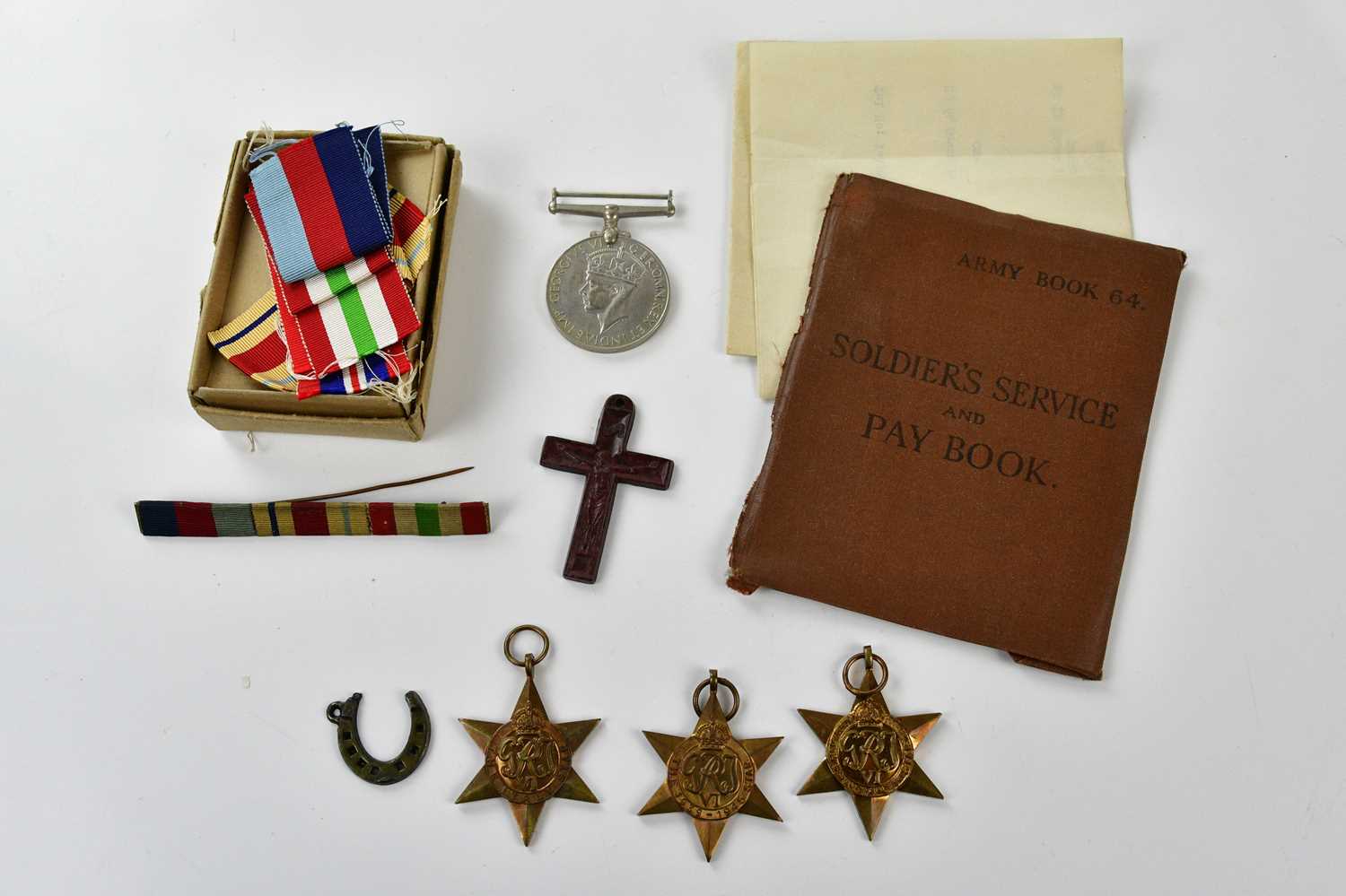 A/SGT N.I.L. BARKER PNR CORPS 13078579; four WWII medals, ribbons, three oak leaves, section of