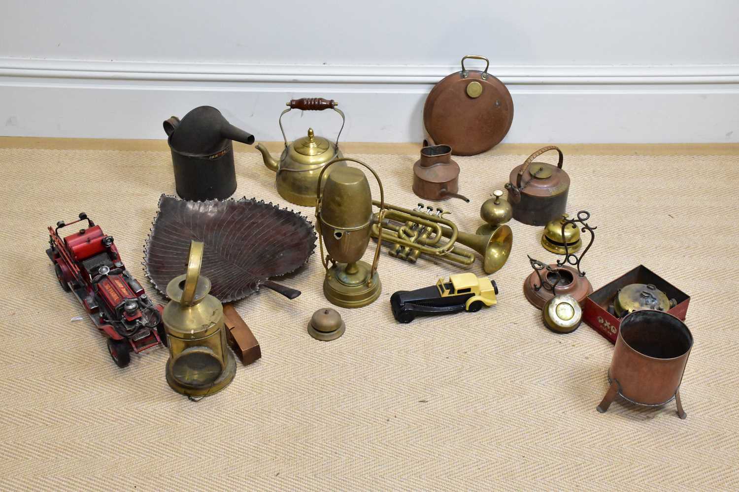A collection of brass, copper and other metalwares to include a green house watering can, length