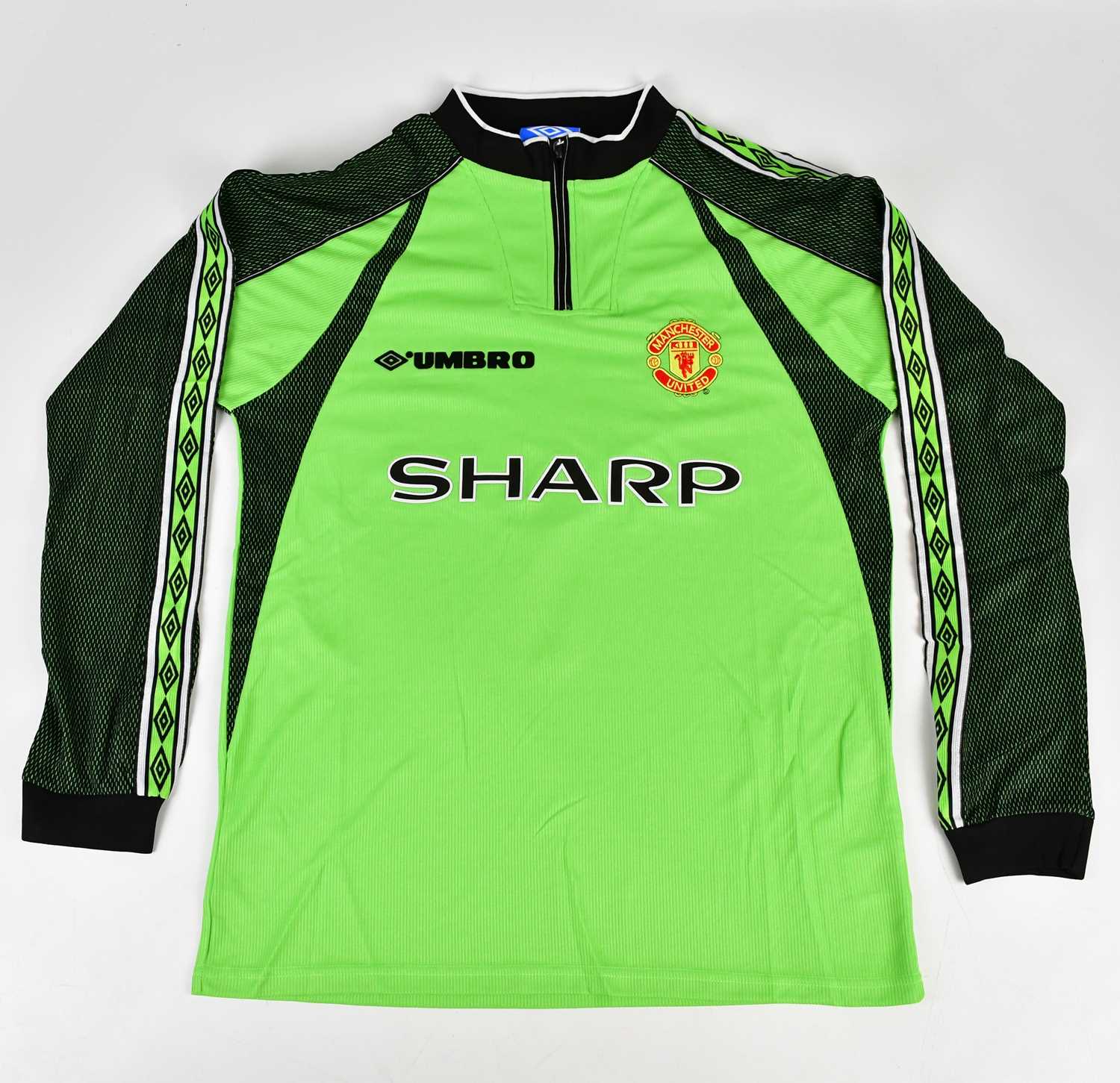 PETER SCHMEICHEL; a Manchester United Treble Winners retro style signed football shirt, signed to