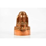 A 19th century copper jelly mould, stamped 209, height 20cm. Condition Report: No pin holes or signs