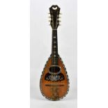 A 19th century rosewood bowl back Italian mandolin, bears label to the inside 'Ferrari & Co'.