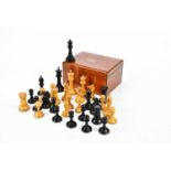 A Staunton pattern chess set in mahogany case, height of king 9.5cm, weighted. Condition Report: The