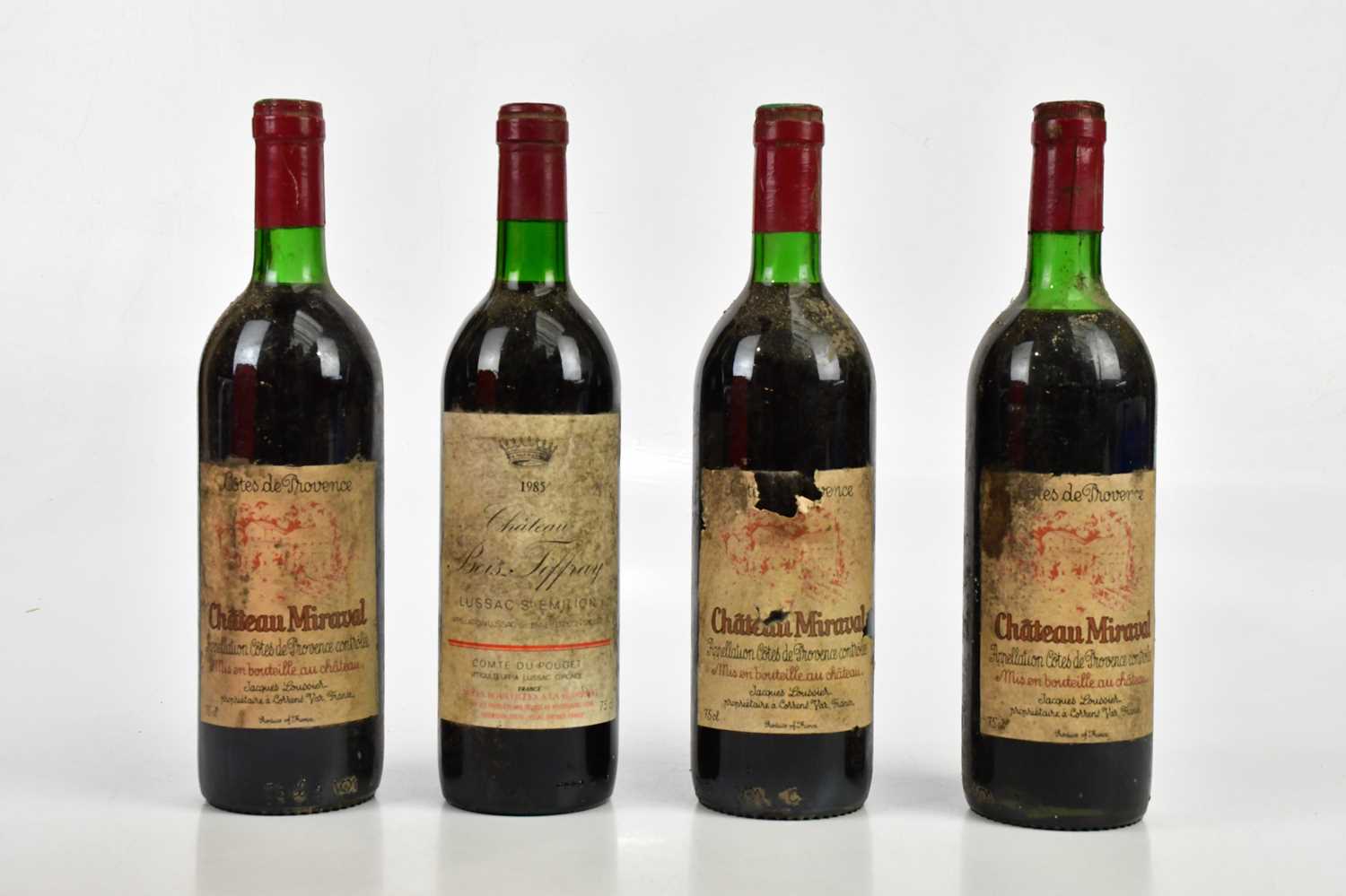 RED WINE; three bottles of Château Miraval, 75cl, together with a bottle of 1985 Château Bois