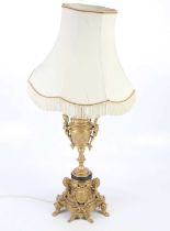 A gilt metal urn table lamp, height 82cm. Condition Report: The item or items in this lot are sold