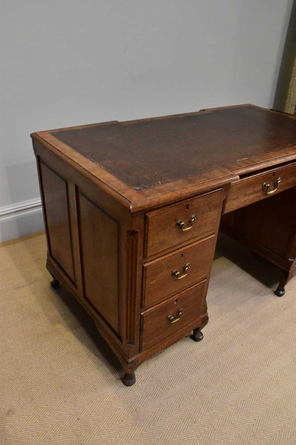 A late 19th century inverted breakfront kneehole desk with leather inset top above an arrangement of - Image 2 of 3